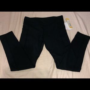 Brand New Black leggings with side pockets Size 12